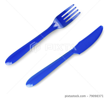 colored plastic fork and knife isolated on white background. colored plastic fork and knife isolated on white background. 79098371