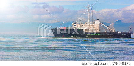 small ship at blue sea near the coast small ship at blue sea near the coast 79098372