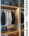 modern wardorbe with set of clothes 79102684
