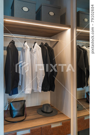 modern wardorbe with set of clothes 79102684