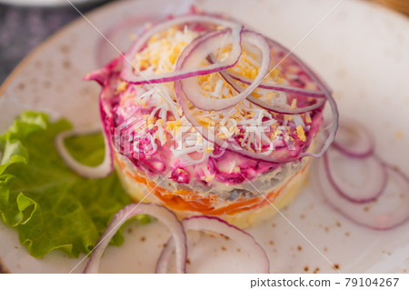 Homemade dressed pickled herring, traditional russian layered salad herring under a fur coat. 79104267