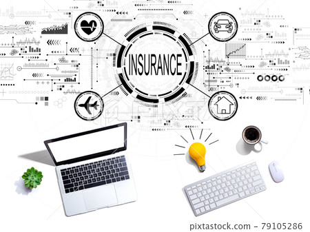 Insurance concept with computers with a light bulb 79105286