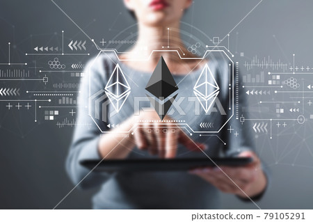 Ethereum with woman using a tablet Ethereum with woman using a tablet 79105291
