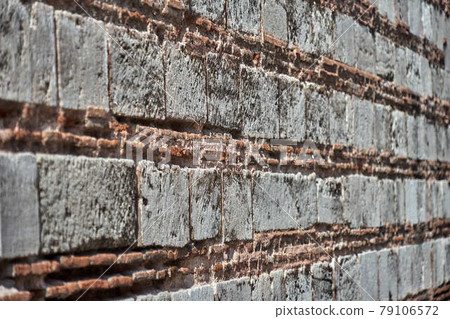 Abstract image with pattern and texture of a historical wall from a close-up photograph 79106572