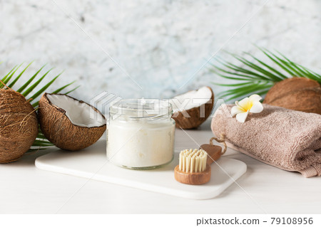Natural coconut oil for body care in spa treatment. 79108956