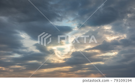 Background with dark thunderstorm clouds at sunset 79109194