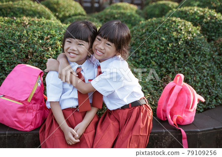 happy student friend in uniform smiling happy student friend in uniform smiling 79109256