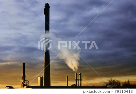 White smoke from the exhaust pipe of a combined heat and power plant that works with fossil fuels White smoke from the exhaust pipe of a combined heat and power plant that works with fossil fuels 79110418