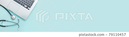 Stethoscope keyboard laptop computer isolated on blue background. Modern medical Information technology, sofware advances concept. Computer and gadget diagnostics and repair Flat lay top view banner 79110457