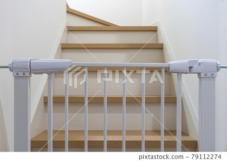 Baby gate installed on the stairs Baby gate installed on the stairs 79112274