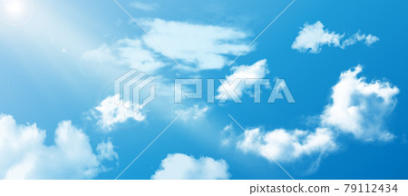 Realistic colorful summer sky with clouds. Blue sky white fluffy clouds sun rays and bokeh light. Realistic colorful summer sky with clouds. Blue sky white fluffy clouds sun rays and bokeh light. 79112434