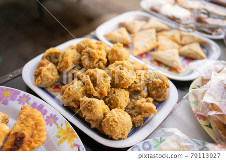 fried tahu walik on a serving plate on the table 79113927