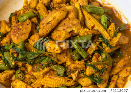 Yellow curry street food Stir-fried chicken with soft fried rice. Flip the curry in the south of Asia. thailand street food with a spicy, aromatic, delicious taste of herbs Yellow curry street food Stir-fried chicken with soft fried rice. Flip the curry in the south of Asia. thailand street food with a spicy, aromatic, delicious taste of herbs 79118097