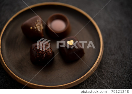 Bonbon chocolate on a plate Bonbon chocolate on a plate 79121248