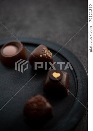 Bonbon chocolate on a plate Bonbon chocolate on a plate 79121250
