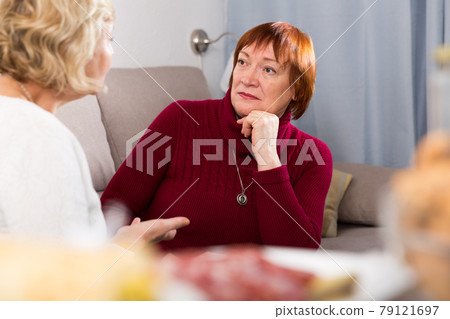 females quarreling in the room females quarreling in the room 79121697