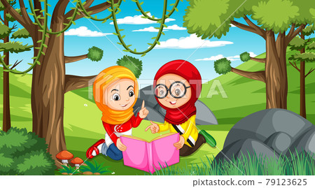 Muslim kids wears traditional clothes reading a book in the forest scene Muslim kids wears traditional clothes reading a book in the forest scene 79123625