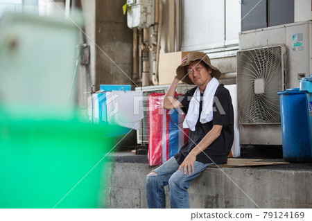 Street life tired homeless sitting Street life tired homeless sitting 79124169