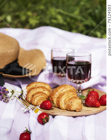 Romantic picnic scene on summer day 79124503