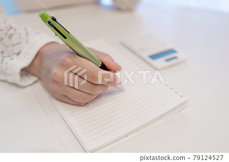 Pen, ballpoint pen, notebook, calculator, telework, home office work, writing qualification, study, thinking, cheek cane, female Pen, ballpoint pen, notebook, calculator, telework, home office work, writing qualification, study, thinking, cheek cane, female 79124527