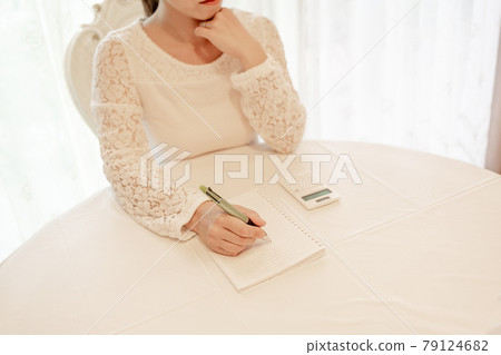 Pen, ballpoint pen, notebook, calculator, telework, home office work, writing qualification, study, thinking, cheek cane, female 79124682