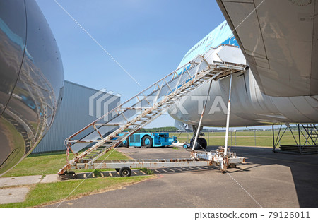 Old staircase at a large airplane Old staircase at a large airplane 79126011