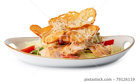 Caesar salad with grilled chicken on white wooden background 79126119