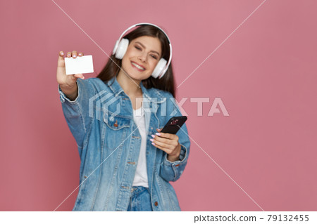 happy beautiful woman in headphones listening to music happy beautiful woman in headphones listening to music 79132455