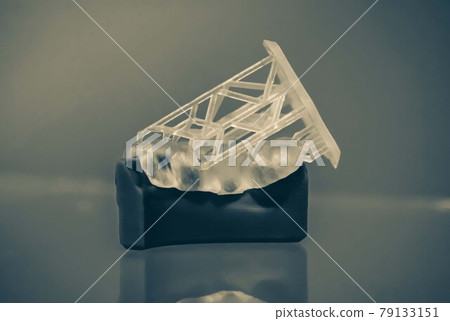 Human jaw printed on 3d printer of photopolymer. Human jaw printed on 3d printer of photopolymer. 79133151