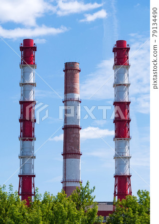 No smoke from industrial pipes close up. against the blue sky. Vertical photo 79134490