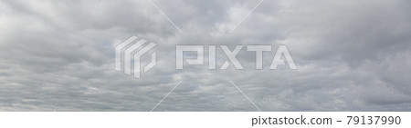 Image of a dark and cloudy sky during the day Image of a dark and cloudy sky during the day 79137990