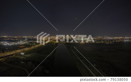 Panoramic aerial view on illuminated skyline of Fort Worth over West Fork Trinity River at night Panoramic aerial view on illuminated skyline of Fort Worth over West Fork Trinity River at night 79138050