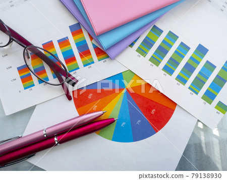 Business image · graph · notebook · glasses · female 79138930