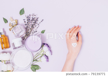 Skin care concept, female hand with applied heart-shaped sample cream 79139771