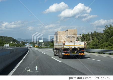 truck driving on highway 79143260