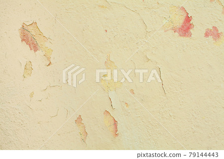 Abstract light yellow old stucco cement wall 79144443