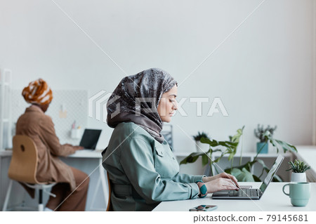 Middle Eastern Woman Working in Office 79145681