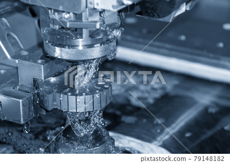 The wire EDM machine cutting the insert mold parts. The wire EDM machine cutting the insert mold parts. 79148182