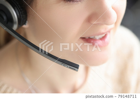 Telesales agent wear wireless headset microphone consult customer support service closeup Telesales agent wear wireless headset microphone consult customer support service closeup 79148711