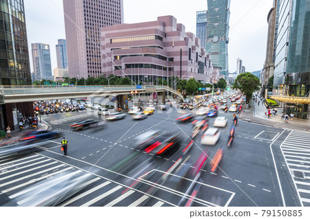 The crossroads near Taipei 101 Building and Taipei International Convention Center in Taipei, Taiwan, is in a busy rush hour of traffic. The crossroads near Taipei 101 Building and Taipei International Convention Center in Taipei, Taiwan, is in a busy rush hour of traffic. 79150885