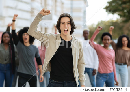 Activists chanting slogans, making strike on the street 79152344