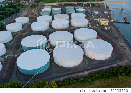 Detail of equipment oil pipeline steel with valve from large oil storage tank 79153550