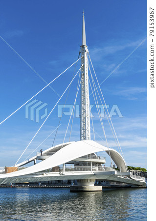 Tourists are visiting the scenery of Great Harbor Bridge in Kaohsiung, Taiwan. 79153967