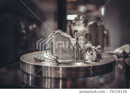 Object printed on metal 3d printer close-up. 79158139