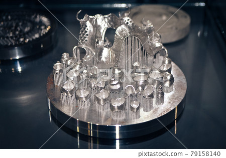 Object printed on metal 3d printer close-up. Object printed on metal 3d printer close-up. 79158140