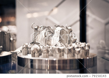 Object printed on metal 3d printer close-up. 79158143