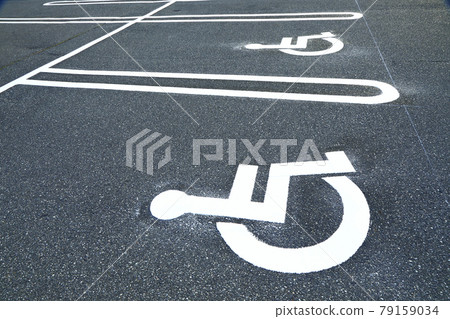 Wheelchair mark in the parking lot (international symbol mark) 79159034