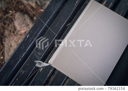 A book placed on a stool 79162158