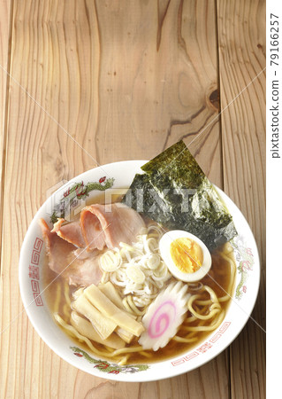 A bird's-eye view of a simple hot soy sauce ramen that you can eat at a stall with char siu, menma, Naruto, etc. A bird's-eye view of a simple hot soy sauce ramen that you can eat at a stall with char siu, menma, Naruto, etc. 79166257