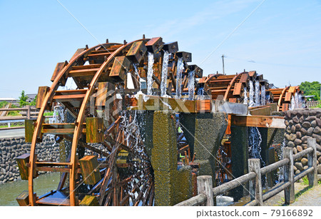 Hishino Triple Water Wheels in Hishino, Asakura City, which rotates with a splash of water 79166892